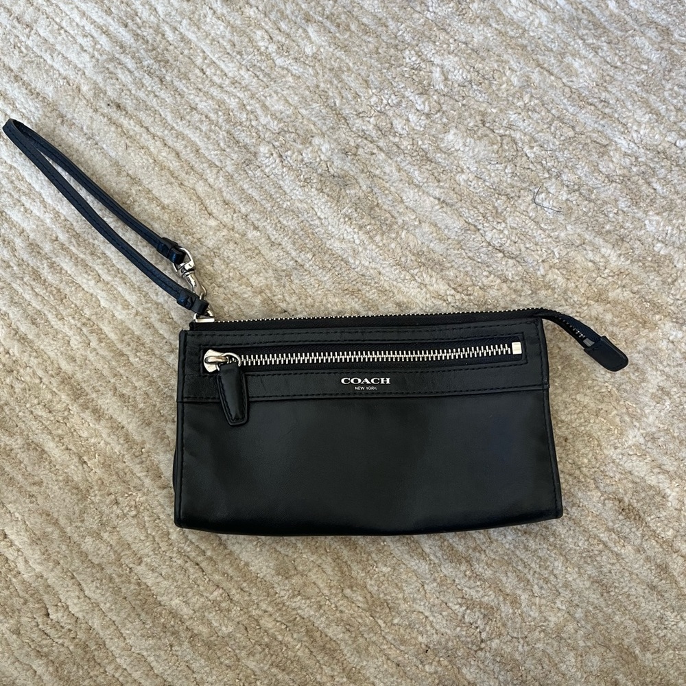 Gently used- Coach wristlet wallet. Black w/ silver hardware